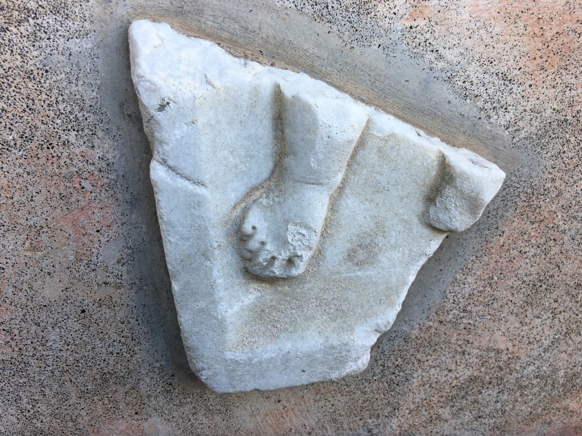 A cute toe carved 2,000 years ago and displayed on the wall of our BnB